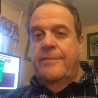 Simon Curry avatar image